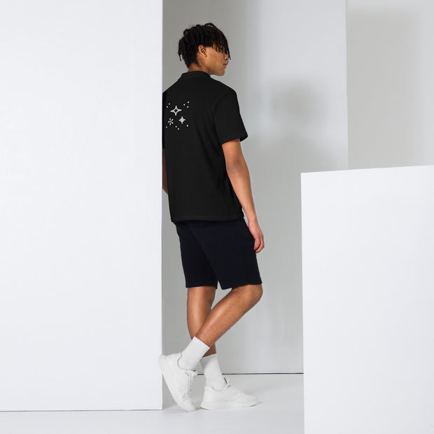 A collection of modern black polo shirts showcasing sleek designs for effortless style