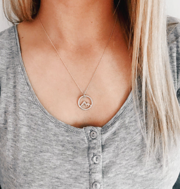 Ascent Adornments: Mountain Motif Necklaces" - A collection of necklaces featuring mountain-inspired motifs, evoking the rugged beauty and symbolic strength of the peaks