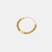 n image showcasing minimalist stainless steel bracelets with 18K gold accents, radiating understated glamour and sophistication
